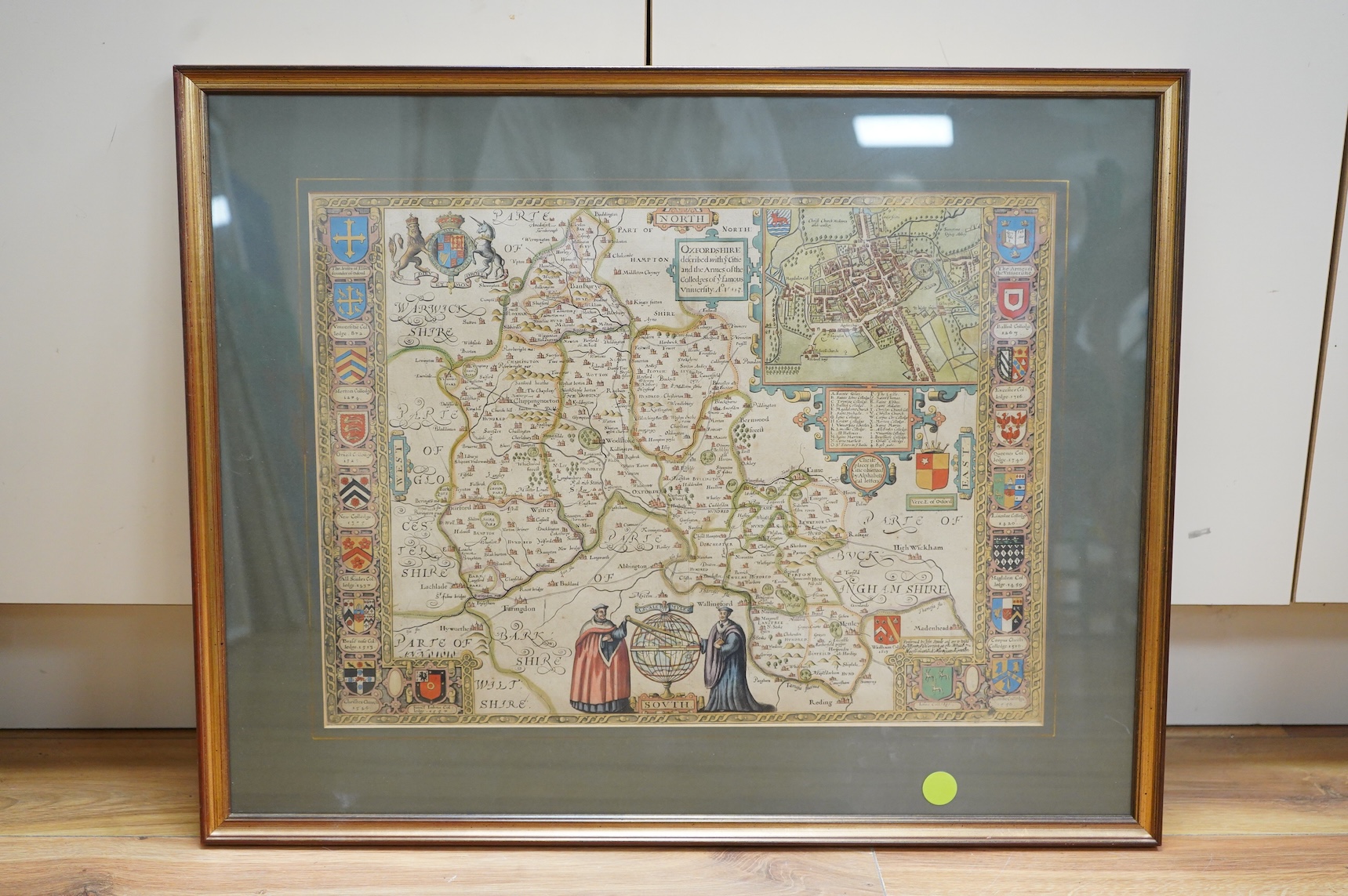 John Speed (1552-1629), Oxfordshire, described within the city and Armes of Colleges of the Famous Vicinity, sold by Henry Overton, London, hand coloured engraved map, gallery label verso, 38 x 51cm